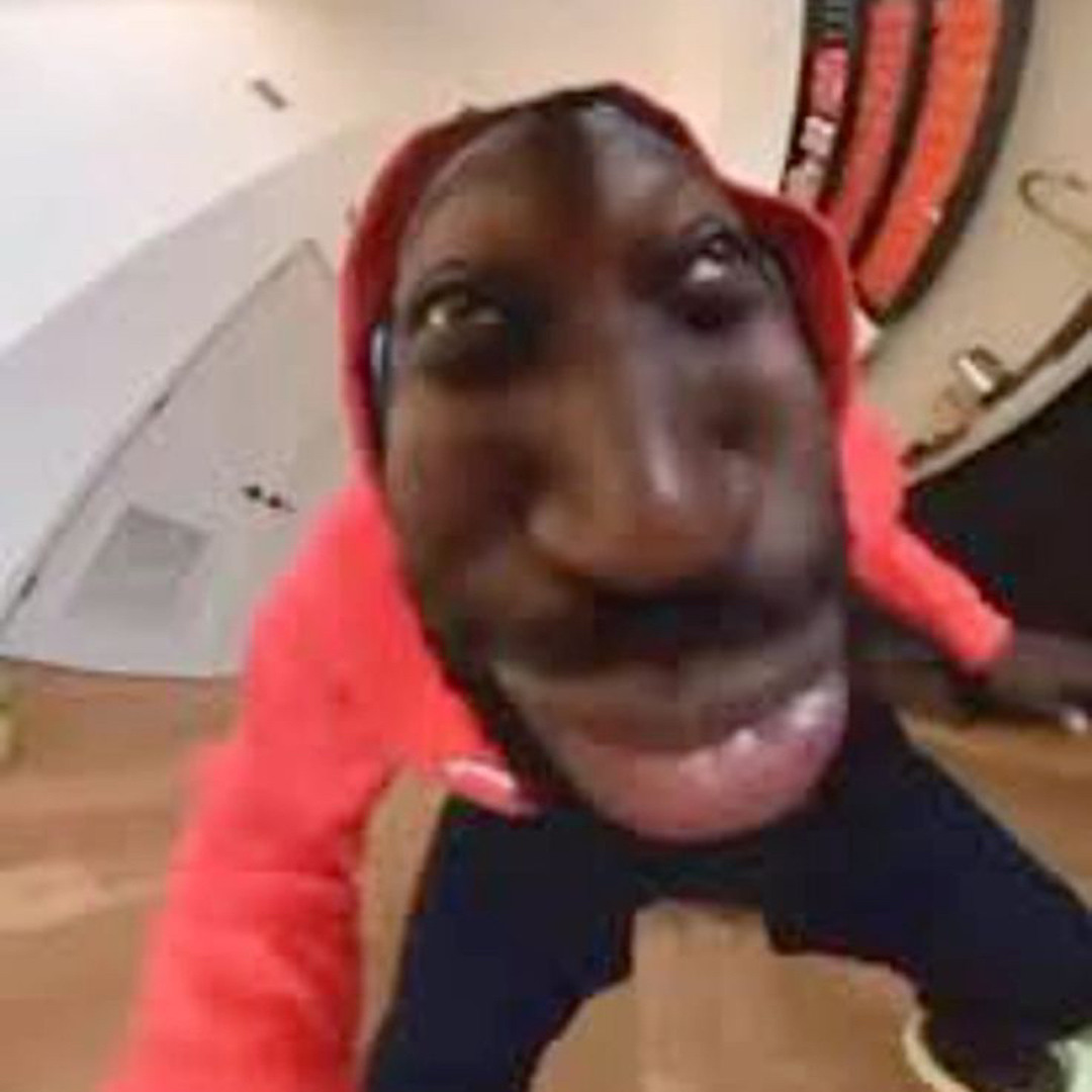 Goofy Ahh moment: Red hoodie grin